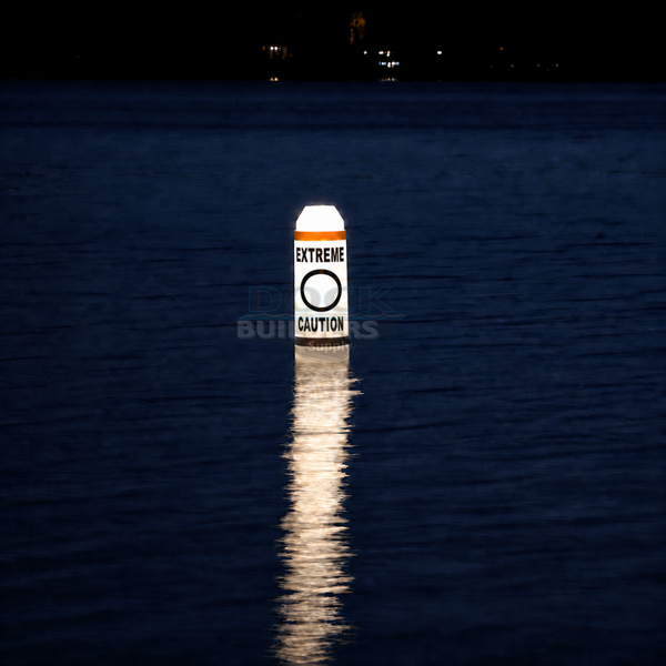 Solar-Powered Lighted Pencil-Style Marker Buoy with "Extreme Caution" Labels